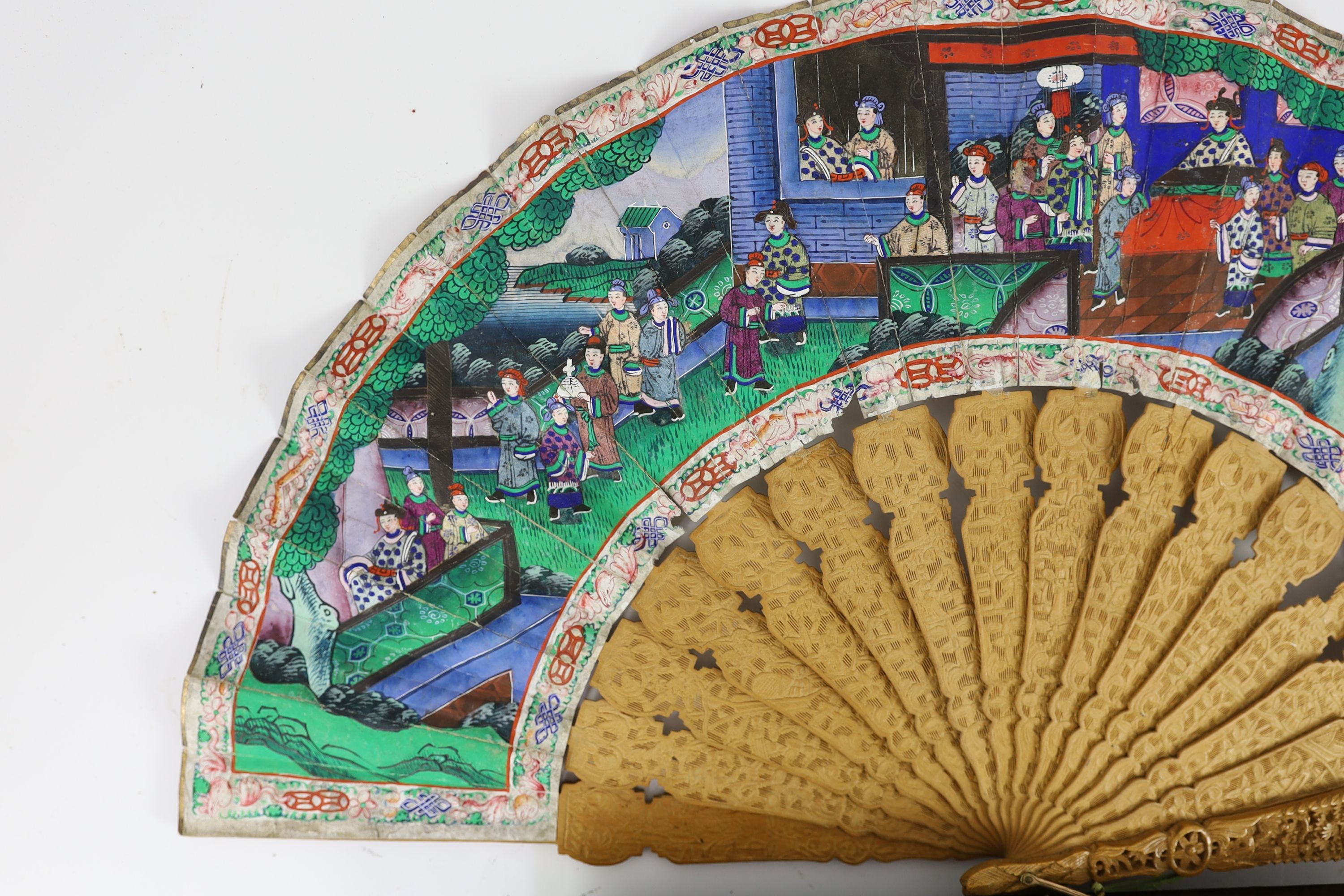A Chinese lacquer cased sandalwood and lacquer fan, 19th century, 32cm, slight damage